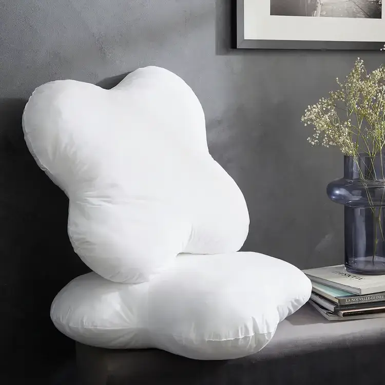 Oreiller ergonomique Dodo Memory Fibre Multiposition, adapté à toutes les positions de sommeil grâce à sa mousse à mémoire de forme souple.