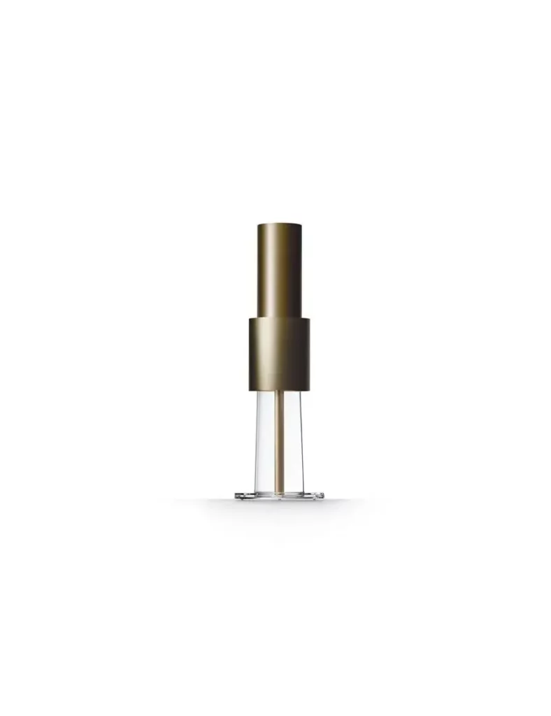 Purificateur ioniseur haut de gamme LightAir avec colonne dorée et base transparente, design suédois et efficacité contre virus